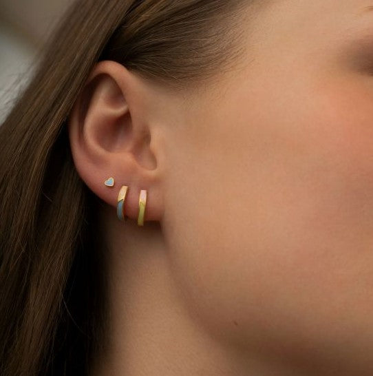 Petit circus huggie earring yellow and pink