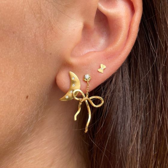 Dangling flow bow earring